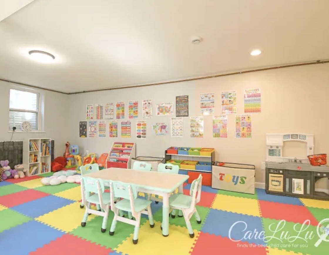 Main classroom with educational posters and activity table
