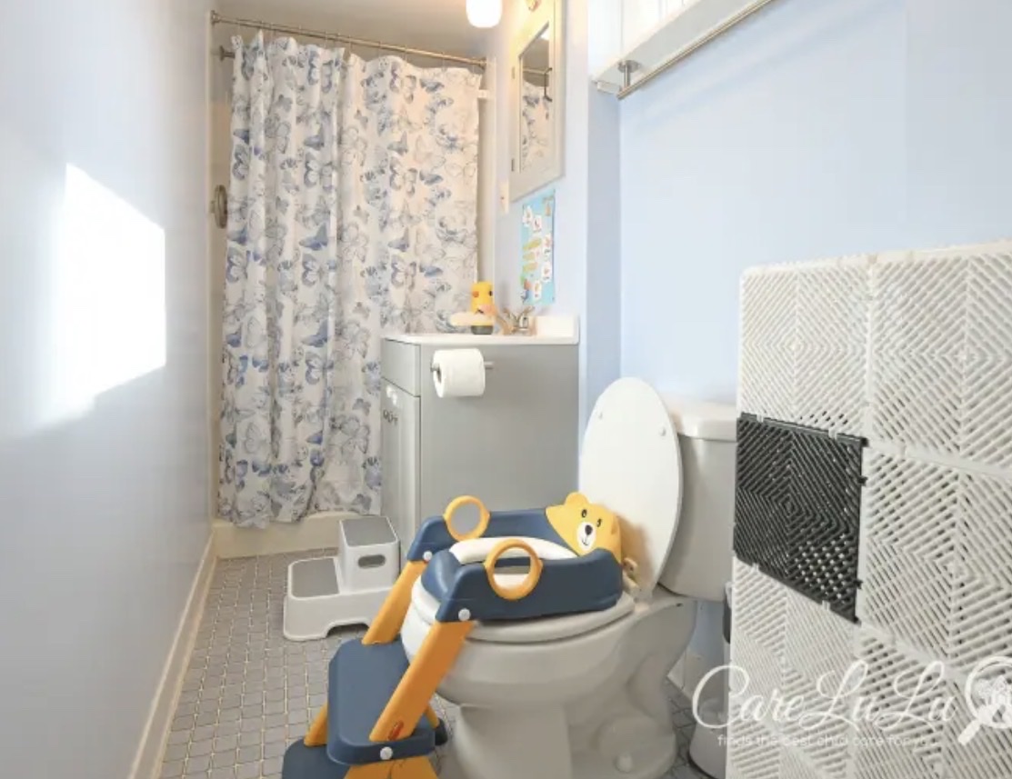 Child-friendly bathroom with potty training setup